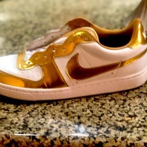White Nikes with Gold Trim